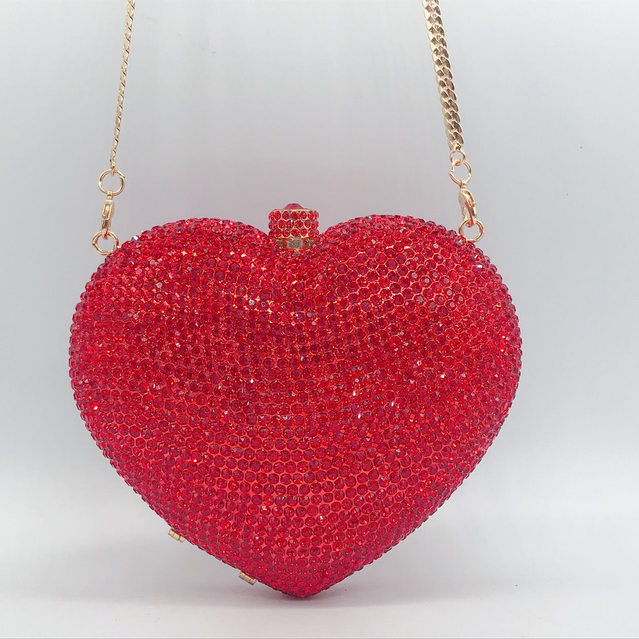 Hand Holding Heart-shaped Diamond Dinner Bag